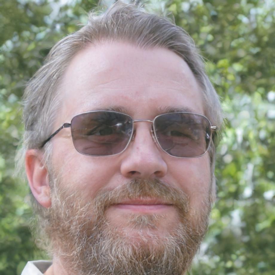 Portrait of Fletcher Baines, financial analyst