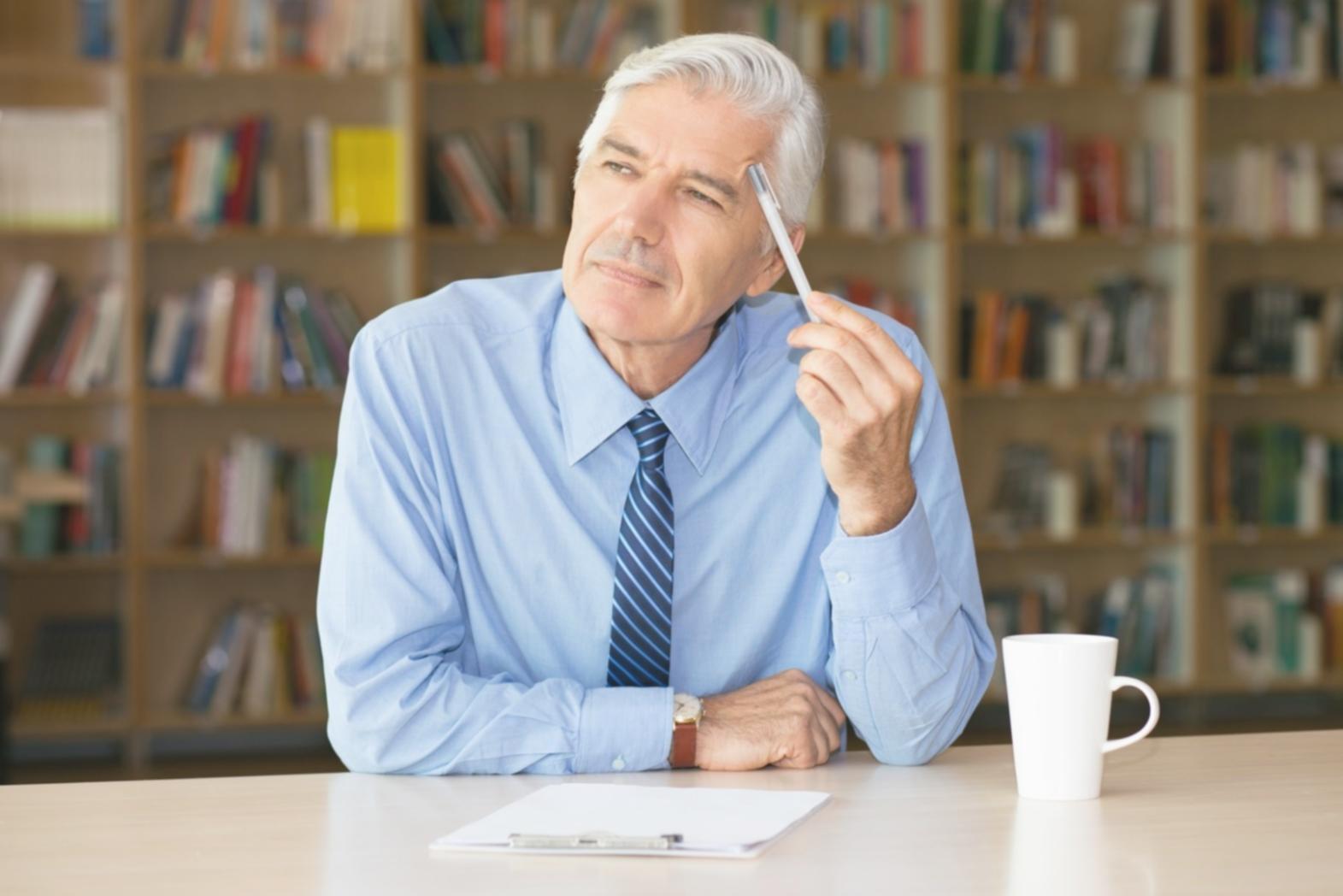 Financial analyst reviewing valuation models and data analysis
